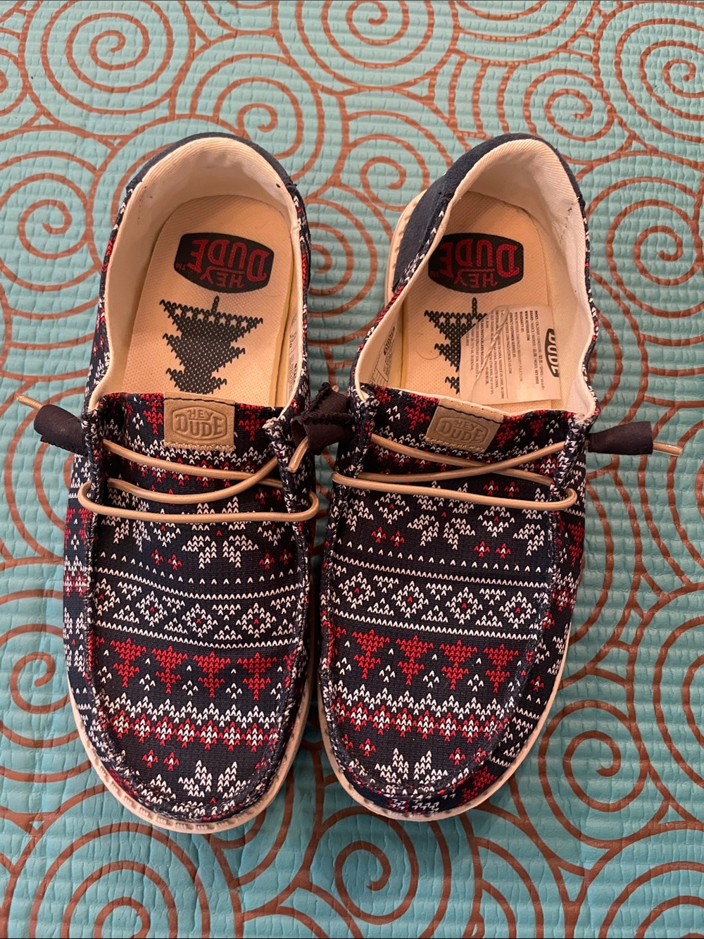 Hey Dude women’s Navy and Red Patterned Christmas Slip-On Sneakers